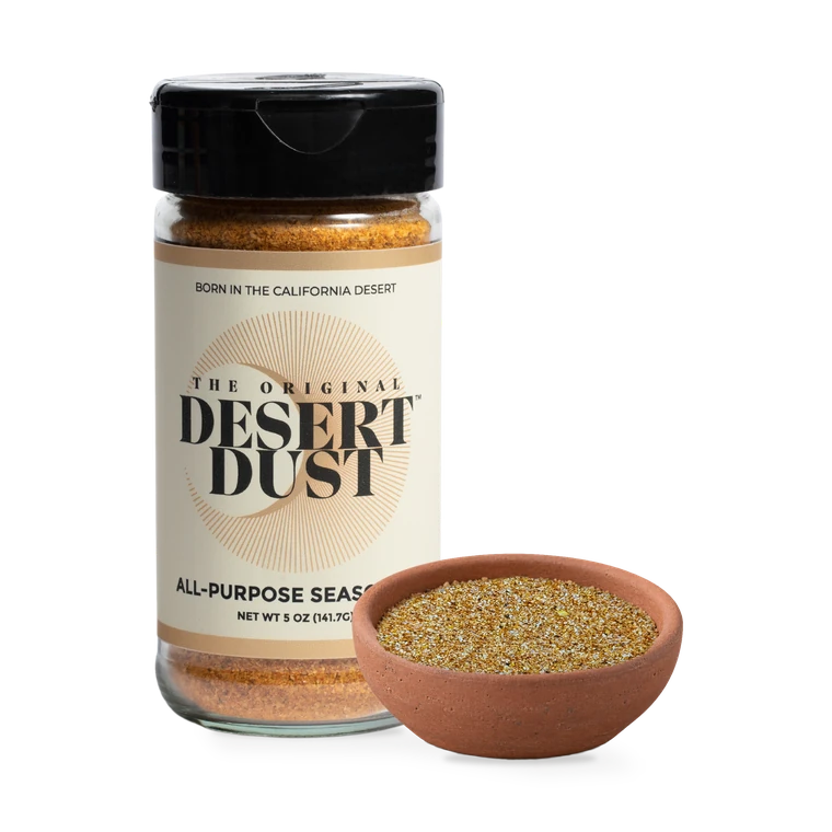 The Original Desert Dust beside a bowl of seasoning