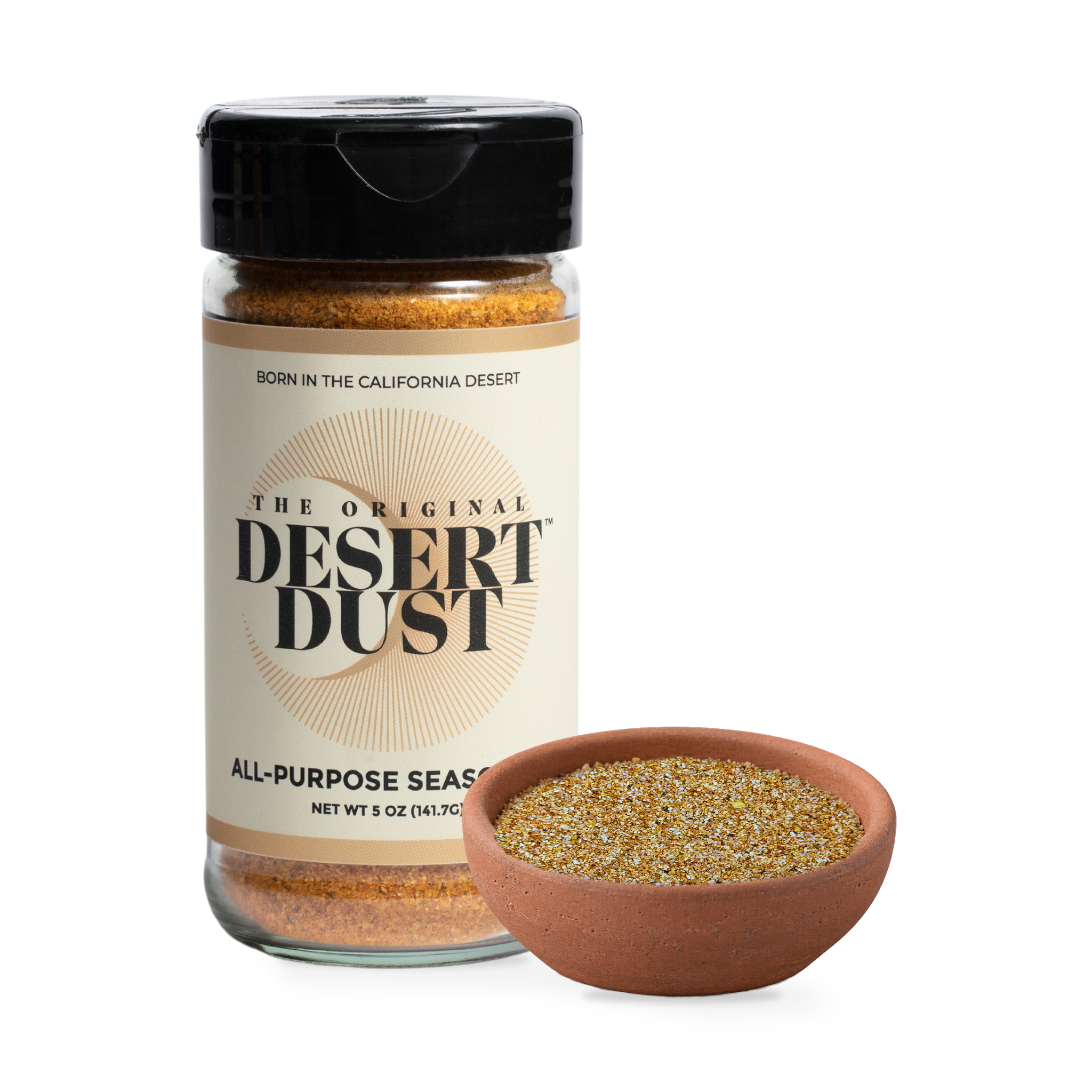 The Original Desert Dust - Date-Based All-Purpose Seasoning beside a bowl of seasoning
