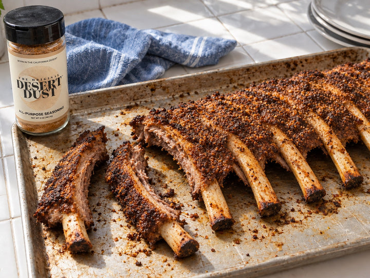 Oven beef back ribs on a well-used roasting tray with Original Desert Dust
