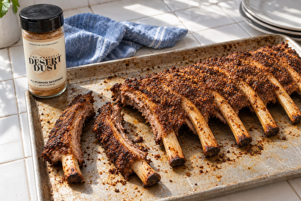Oven beef back ribs on a well-used roasting tray with Original Desert Dust