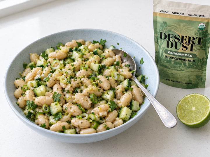 White bean salad with diced cucumber, scallions and parsley in a light lime dressing.