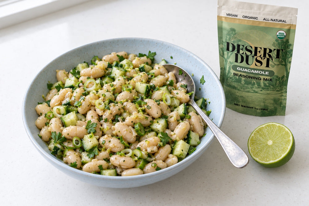 White bean salad with diced cucumber, scallions and parsley in a light lime dressing.