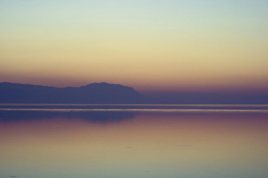Sunset over the Salton Sea and desert mountains