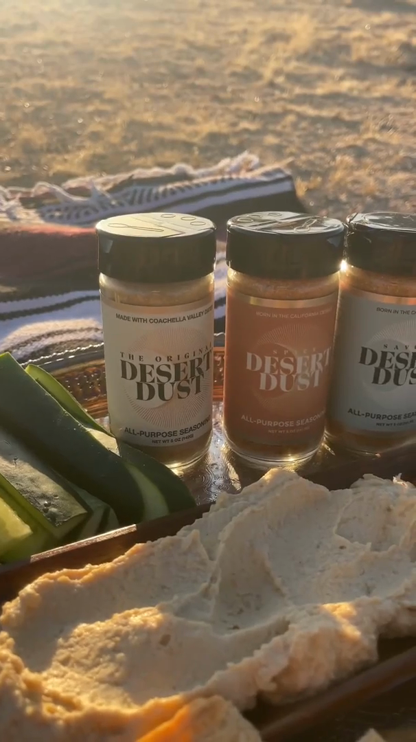The desert picnic table with food and Desert Dust
