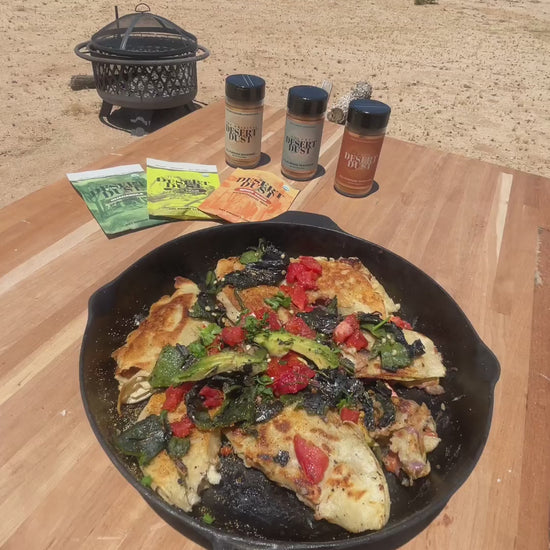 A skillet meal at a desert picnic table with Desert Dust seasonings