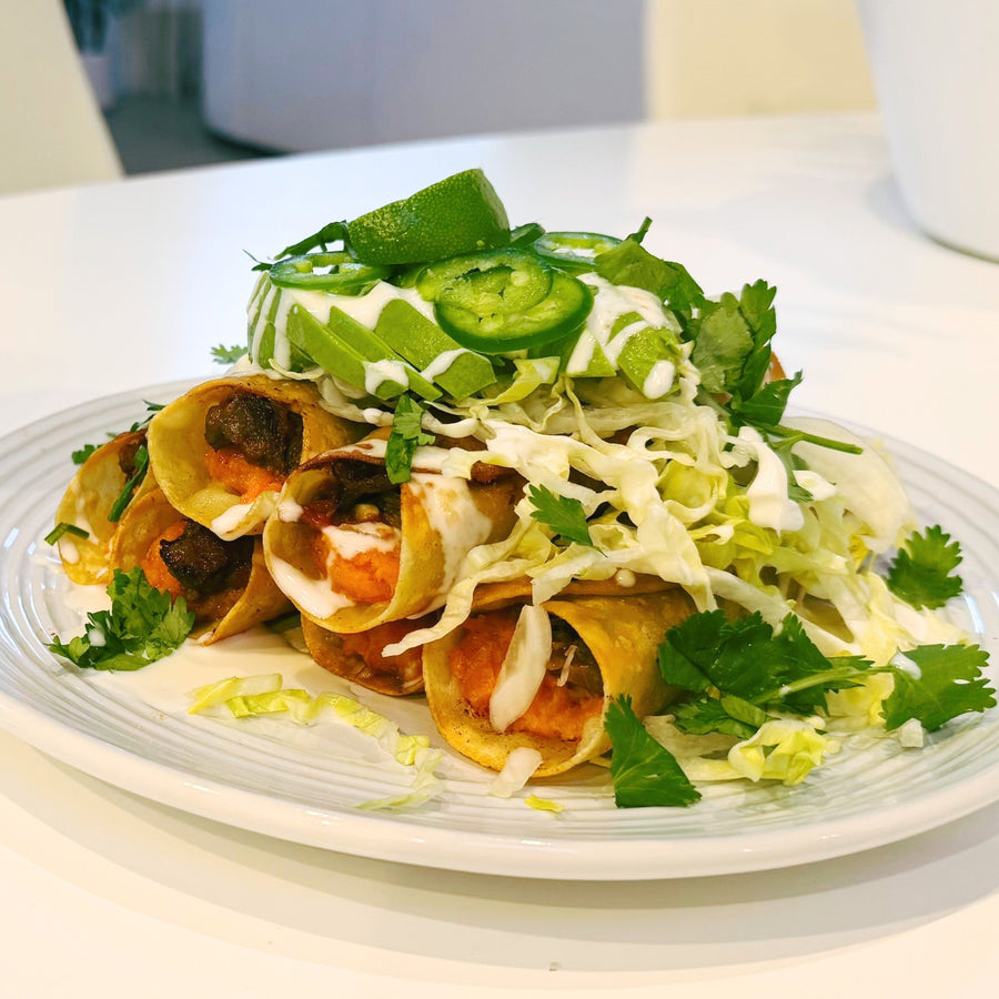 Chef Steph’s spicy beef and sweet potato flautas with lettuce, avocado, sour cream and jalapeño
